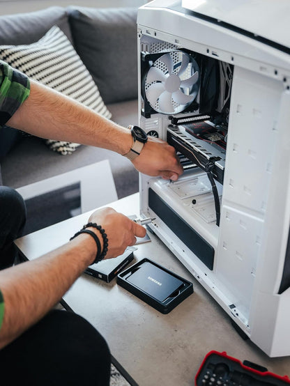 Samsung 870 EVO 1TB SATA III Internal SSD — being installed in a desktop PC