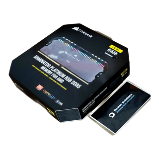 Corsair Dominator Platinum RGB DDR5 64GB (4x16GB) 5600MHz CL36 AMD XMP — authentic angled box front; Devino card corner