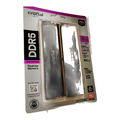Crucial Pro OC DDR5 RAM 32GB Kit (2x16GB) 6000MHz CL36 XMP 3.0 & AMD Expo Black — blister front angled on marble; Devino card
