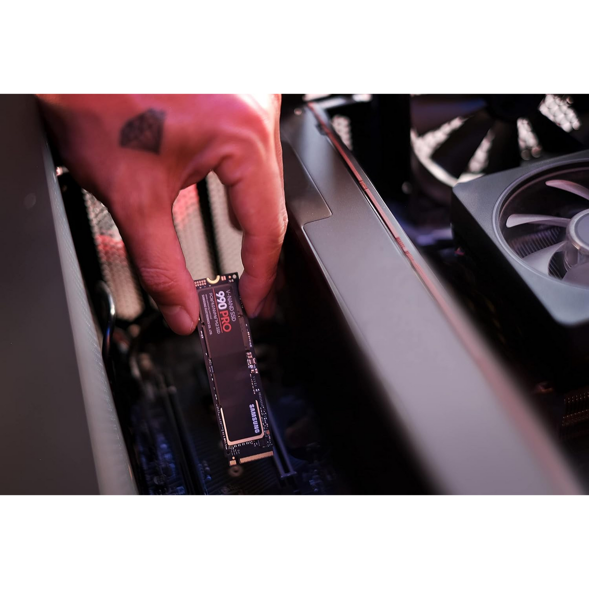 Samsung 990 PRO 4TB NVMe PCIe 4.0 SSD — being fitted into a desktop PC