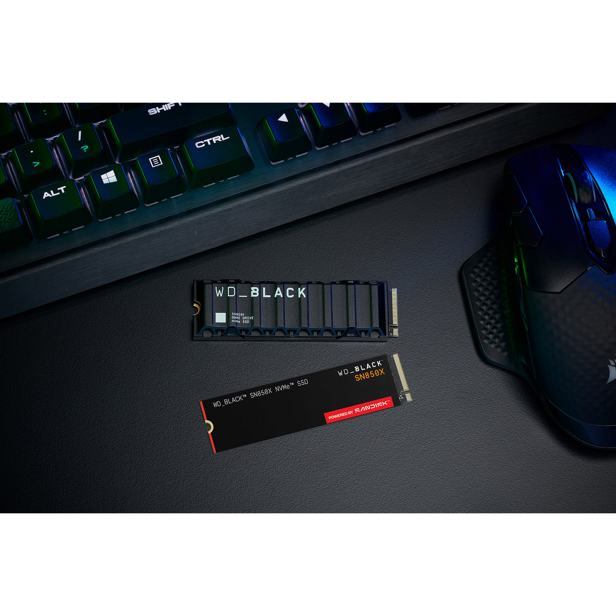 WD_BLACK SN850X 1TB NVMe SSD — shown on a gaming desk alongside the heatsink model
